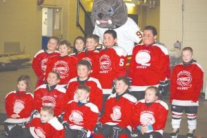 The Cook County Hockey Mite 1 and Mite 2 hockey team had an exciting adventure on February 18. The Mites played at Amsoil Arena during a UMD women’s game. Pictured here with the Bull Dog mascot are (L-R, front) Andrew Hallberg, Jake Carpenter. (L-R, middle) Katie Carpenter, John VanderHeiden, Ryan Bilben, Kevin Viren, Bridget Cooley. (L-R, back) CJ Luehring, Kole Anderson, Ryan Christensen, Nate Bilben, John Pierre, Patrick Pierre Jr., Eli Swanson. The final jamboree for both teams is March 10 - 11 in Silver Bay. The kids have worked really hard this year in practice and tournaments. Although the weather was not always in their favor, they had a great season.