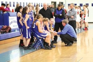 At a recent home game head coach T.J. Super goes over offensive and defensive strategy with his team. The girls won their first two play-off games but fell to Mountain Iron-Buhl 54-35 on Wednesday, March 7. The Vikings led that contest 30-26 at half. MIB will face Barnum in the Section 7A finals to see who will go to state. A wrap-up of the final game and season will be in next week’s newspaper.