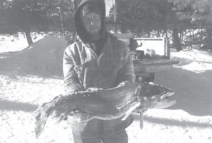 Tyler Smith of Grand Marais caught this very nice lake trout on February 5 on Trout Lake. It took about 15 minutes to get the 14-pound lunker through the ice.