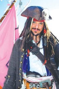 Minnesota’s Captain Jack Sparrow delighted kids of all ages—offering sparkling gold coins to kids, teaching sword play (with sticks) and flirting with the ladies. He and his entourage danced the night away at Trail Center Lodge with D’Merritt.