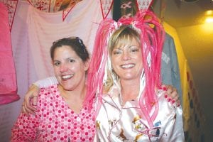 MFAC organizers Sue Prom (left) and Mary Black not only oversee all the MFAC activities, they also find time to shop for outrageous pink attire. Thanks for a great event, ladies!