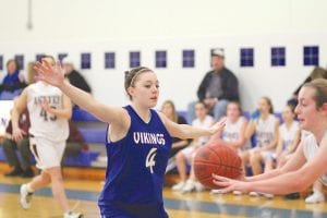 Above: Leah Utities didn’t get her hand on this pass, but she did intercept many passes and had a ton of steals for the Vikings this year. Right: Theresa Morrin made a lot of points for the Vikings on drives through defenders to the basket. Morrin had a great season for the Vikings and will be one of the leaders coming back for her senior year.