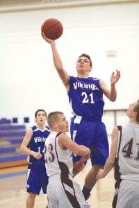 Senior guard David Bergstrom went up high for a lay-up against Cromwell. Bergstrom scored 25 points in the Vikings' last game of the year and was named first team all-conference with Dylan Quaife. Both seniors will be sorely missed, not only for their play but their leadership.