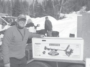 In second place, winning an ice auger donated by Buck’s Hardware was John Anderson of Grand Marais. He caught a 2 pound 13 ounce trout.