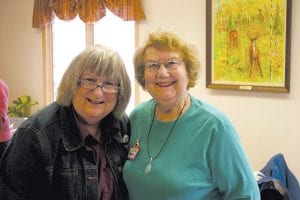 After 40 years as treasurer of the Cook County DFL party, Bev Denyes (right) resigned this year. At the DFL County Convention on March 10, she received a standing ovation and a gift from DFL County Chair Diane Parker.