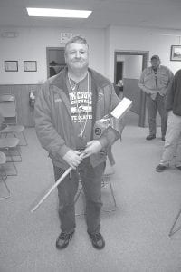 Left: Steve DuChien did not receive a royal scepter as a retirement gift from the City of Grand Marais. He did receive an old line and pipe locator, however.