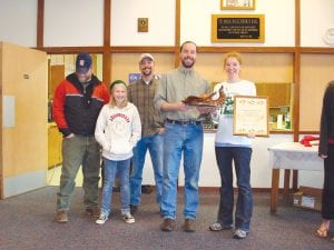 The winners of the coveted cornucopia award at the 2012 Chili Cook-Off Contest at St. John’s Catholic Church on Saturday, March 24 were Grand Portage National Monument staff. (L-R) Bill Clayton, Bill’s daughter, Lilly, Brandon Seitz, Steve Veit, Deb Veit. (Not pictured: Jessica Barr) Their winning chili was “Slackjaw’s Hillbilly Chili.”