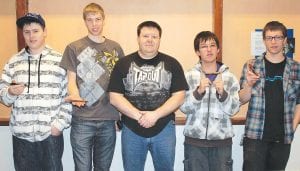 Cook County Boy Scouts learned a new skill and made some memories recently when they learned to use a lathe to make a wooden pen. The Scouts show off their finished product—a unique handmade wooden pen. (L-R) Aaron Breitsprecher, Kyle Martinson, instructor Richard Fortunato, Rusty Day and Alex Ditmanson.