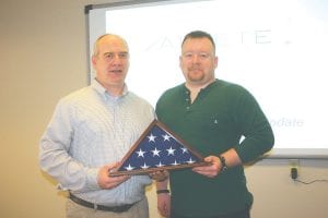 Mike Ross of Lutsen, an instrument/lab/environmental specialist at Minnesota Power, is also a retired U.S. Army Sergeant First Class. On Wednesday, April 4, Ross presented David Rannetsberger and Minnesota Power with a “Patriotic Employer” award in recognition of the support he received from Taconite Harbor Energy Center employees while he was deployed to Afghanistan. In addition to the award, Ross presented a triangle-folded flag in an attractive wooden display case. Ross said the flag had flown over his base, Camp Dwyer.