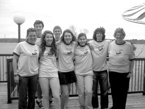 The award-winning State Knowledge Bowl team! (L-R) Coach April Wahlstrom, Sean MacDonell, Audrey Summers, Ben Seaton, Mara MacDonell, Sarah Larsen, Joey Chmelik and Teacher Dorie Carlson at Cragun’s Resort where the state finals were held.