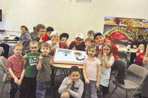 To celebrate the end of a successful hockey season, the Cook County M1 and M2 teams and families got together on March 17 for a wrap-up party. The Cook County hockey group said thanks for the cool hockey stick cake donated by Gene’s Foods. Pictured (not in order) Elijah Swanson, Andrew Hallberg, Jacob Carpenter, CJ Luehring, Katie Carpenter, Bridget Cooley, John VanderHeiden, Danny Deschampe Jr., Ryan Bilben, Nate Bilben, Patrick Pierre Jr., Kole Anderson, Kevin Viren and John Pierre. (Not pictured: Cy Oberholtzer and Ryan Christiansen).