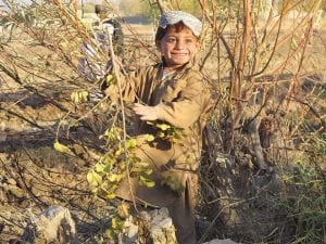 SFC Michael Ross of Lutsen served in a unit that conducted “route clearance,” otherwise known as bomb patrol. His work in Afghanistan protected not only U.S. and allied forces, but civilians like this young boy as well.