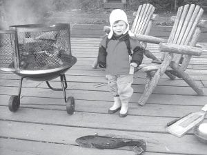 Berendt “Bear” Atkinson, 3, wanted nothing to do with the scary-looking eelpout he and his dad, Niel Atkinson caught while ice fishing on March 25. Niel agreed and said he could hardly stand to touch the slimy fish. Although once it was skinned and cooked for dinner, they both decided it wasn’t so bad after all.