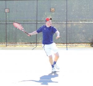 Only a ninth grader, Lars Scannell has been a force for the Vikings' tennis team, defeating all of his opponents at the No. 2 singles matches so far. Lars plays behind No. 1 singles player David Bergstrom, upper right, who is also undefeated and hoping to once again return to state. Eighth grader Pete Summers (bottom right) has always been winning his matches at the No. 4 singles spot for the Vikings. The Vikings tennis team is young but very talented.