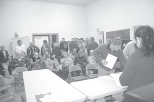 Citizens at the March 2012 Lutsen Annual Meeting jockey for a place to sit before the meeting begins. The majority of citizens in attendance at that meeting supported expansion of the fire hall/town hall. The project is moving ahead with the selection of contractor Max Wahlers to complete the renovation.