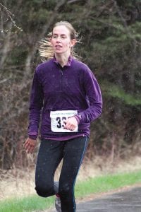 Ashley Lykins of Duluth looked comfortable (and warm) winning the women’s Ham Run Half Marathon in 1:32:18.5.