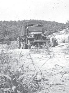 Kenny Lovaas served in the U.S. Army 1st Cavalry 77th Field Artillery in Korea. Far left: One of the vehicles that Lovaas worked on in the motor section. Above: Lovaas in front of his temporary home north of the 38th Parallel. Left: Sergeant Lovaas in dress uniform.