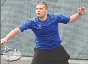 Above left: Justin Goldstein delivers a soft shot over the net to score a point for his doubles team. Goldstein usually partners with Collin Berglund, but sometimes plays doubles with Wick. Above right: Collin Berglund hit a nice forehand on this play. Collin plays both singles and doubles for the Vikings.