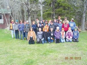 A large group of students completed the Minnesota DNR youth firearms and hunter education safety class in April and May, completing three hours of field exercises on May 5. The 27 students, with their volunteer instructors, are pictured here after the field test.