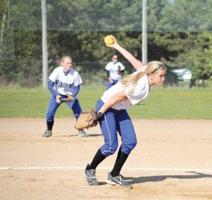 Far left: Rocket armed Sarissa Falk pitched a beautiful game against Northland Remer, leading the Vikings to their first section 7A play-off win in years. Above: Katie VanderHeiden scoops a ball out of the dirt and makes a fine defensive play. Left: CeCe Olsen gets ready to bat against the Eagles. Olson, the lone senior on the team, was nicknamed “hoover” for her fielding skills at second base.