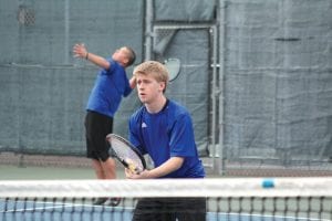 Justin Goldstein gets ready to serve while his double’s partner Collin Berglund is ready for the return in their match against Cloquet. The dynamic duo won the match in a two set tiebreaker to lead the Vikings to the win over the Lumberjacks.