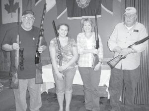 The Arrowhead chapter of the Minnesota Deer Hunters Association held its sportsmen’s banquet at American Legion Post 413 on Thursday, May 17. Along with dinner, games, and information about deer hunting in Minnesota, there were raffles with guns as prizes. Winning this year were (L-R) Alan Klotzbach (who won two guns!), MaeAnna LaFavor and her mom, Laura LaFavor, Linder Peterson.