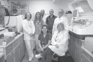 The Cook County North Shore Hospital passed inspection by the College of American Pathologists (CAP) on May 1 and 2 with flying colors. (L-R, standing) Nadine Brown, Lab Supervisor Jennifer Backstrom, Joe Malkovich, Lab Medical Director Dr. Jon Steinhauer, Denise Murray. (Seated, L-R) Bryann Bockovich, Gine Meissner.