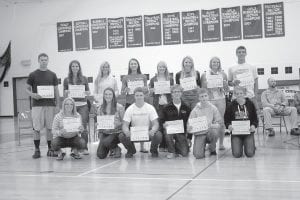 Twenty student athletes from Cook County had the fine distinction of making the 2012 Polar League Academic All-Conference list. Athletes had to maintain a grade point average of 3.7 or higher to be selected. The athlete scholars are (L-R, front) Anna Carman who participated in softball and volleyball; Megan Lehto, Alpine skiing and softball; Clay Johnson, football; Ben Seaton cross country running, Nordic skiing and track; Sterling Anderson, baseball; Rachel Wieben in softball and volleyball. (L-R, back) Colin Everson, who competed in football, basketball and baseball; Katie VanderHeiden in softball; Sarissa Falk in cross country running and softball; Ashley Deschampe in volleyball and basketball; Michaela Buchheit in volleyball; Molly Zafft in track and basketball; Cecelia Olsen in volleyball and softball; and David Bergstrom competed in tennis and basketball. (Not pictured are Mara MacDonell who participated in cross country running, Nordic skiing and track; Sarah Larsen in Nordic skiing and track; Kyle Martinson in track and Alpine skiing; Audrey Summers, cross country running, Nordic skiing and track; Joey Chmelik, cross country running, Nordic skiing and track; and Charlie Lawler, football, Alpine skiing and baseball.)