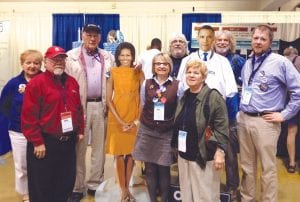 The Cook County residents who represented Cook County at the State DFL Convention were (L-R) Pat Campanaro, Frank Dvorak, Larry Caven with Michelle Obama, Mary Ann Atwood, Stan Tull, Barb Dvorak, Barack Obama with Denny FitzPatrick and Anton Moody.