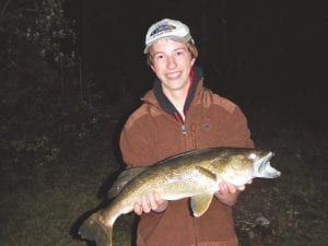 Above: Alexander Hay shows off the very nice 26-inch walleye he caught and released at the family’s cabin near Grand Marais on Memorial Day weekend.