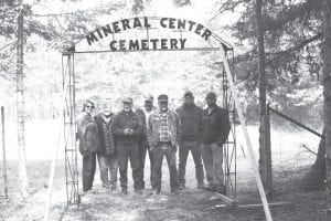 The Linnell family descendants who worked to erect a gate at the Mineral Center Cemetery in April 2010. (L-R) Alva Djerf, Wanda Abramowski, Roger Abramowski, Bert Bockovich, Richard Bockovich, John Bockovich, Nick Bockovich.