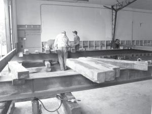 On Monday, June 18, crews from S.J. Bautch Construction prepared the old fire hall building at the Lutsen Fire Hall on the Caribou Trail for transport to a new site a few miles up the road. The land under the old building was needed for the Lutsen townhall/ firehall expansion and the Lutsen Trailbreakers needed storage space, so the building was donated to the club, which paid for transport to its new location. The snowmobile club will use the building for storage of trail maintenance equipment.