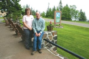 Maureen and Michael O’Phelan outside Cascade Lodge & Restaurant on June 9, when they held an open house celebrating the 85th anniversary of their business. The O’Phelans bought Cascade in 2004. When they arrived here from other professions, Maureen as an attorney and Michael as an engineer, they experienced a few surprises but have positive things to say about the rewards of resort ownership.