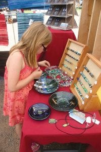 Above: Young and old enjoyed the beautiful jewelry on display.