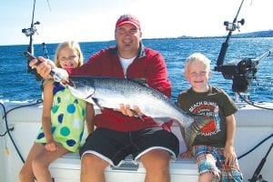 Above: Olivia Laidlaw from Sartell, MN, caught this beautiful 10-pound, 30.5-inch king salmon with help from her dad Adam Laidlaw on July 7. They were fishing with Captain Darren Peck of Tofte Charters. Her brother Wyatt said he was going to catch the big one next time.