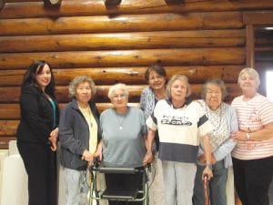 A group of woman attended the June Grand Portage Reservation Tribal Council meeting to witness the swearing in of Chair Norman Deschampe and new Councilmember Marie Spry. The women wanted to show their support and acknowledge that there are now two women on the Tribal Council. The women are the oldest and youngest council members. Attending the oath of office ceremony were (L-R) RTC Treasurer April McCormick, Ellen Olson, Bernice LeGarde, Committeeman-at-Large Marie Spry (behind), Diane Johnson, Doris Blank and Carol Hackett.