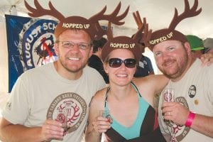 The Mattern family got in the spirit with the Hopped Up Caribou hats. (L-R) Tom Mattern, Andrea Mattern and Ed Mattern had a great time at the Caribou Highlands Hopped Up beer festival last weekend.