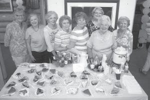 One of the biggest, and easily the tastiest, fundraisers of the year is the Cook County Hospital Auxiliary Pie and Coffee Social during the Grand Marais Arts Festival. This year the event was Saturday, July 14 at the Johnson Heritage Post. Helping set this yummy event up were (L-R) Thelma Hedstrom, Evelyn McDonald, Barb Erickson, Carol Berglund, Mary McElevey, Carole Quaife, June Olsen and Nancy Lindquist. The ladies raised almost $1,000 to benefit the North Shore Care Center and Hospital— and they raised as much or more in goodwill.