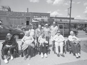 North Shore Care Center residents have been enjoying our great summer weather. They recently took a trip downtown for shopping and fun at Harbor Park. (L-R, front) Irma Toftey, Donna Willett, Marge Jamison, Janet Morgan, Eleanor Matsis. (L-R, back) Jaymee Dossey, Marigold Linnell, Marie Jacobson, Belinda Hudler.