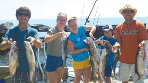 This Wisconsin family had a great day on the water with the Halsnoy Fish Company in Tofte. Fishing with Captain Dale Tormondsen the group caught several nice fish, including two over 31 inches on Sunday, July 29. (L-R) Lucas Vanyo, Cedar Weyker, Seaira Weyker, Mitchell Vanyo, Paul Vanyo.