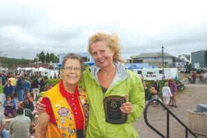 The Grand Marais Lions Club is a celebration of community and an important part of the celebration is recognizing citizens who have made a difference in our community. The 2012 Cook County Citizen of the Year is Deb Benedict, executive director of WTIP Radio. Lion Rosemary Lamson made the presentation on the Harbor Park stage on the very windy Saturday, August 4.