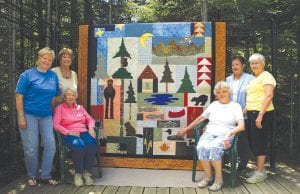 This wonderful, whimsical Northwoods quilt will be raffled at the Mid-Trail Fire Department Fundraiser on Saturday, August 18. The event includes a flea market, boutique, and live auction as well as refreshments. Quilt raffle tickets are available at The Loon’s Nest mid-Trail or at Crystal’s Quilt Shop in Grand Marais. Some of the quilters who worked on the quilt are (L-R) Judy Edlund, Joan Perusse, Ginny Tuttle, Lee Zopff, Carol Stockman, and Ina Huggenvik.