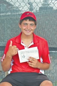 Middle: Boys' 16 singles champion was Martin Schneider of Duluth.