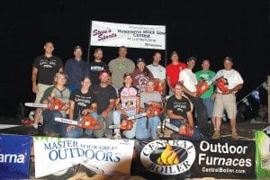 There were a record number of competitors at the Steve’s Sports and Husqvarna Stock Saw Contest at Lumber Camp on Friday, August 3. Sixteen of the professional sawyers who took part are pictured here after the event, which ran until dark. (L-R, front) Desiree Danielzuk, Skyler Johnson, Jeff Eliasen, Jenny Atkinson, Tom Stockman, Clay Johnson. (L-R, back) CoLee Johnson, Paul Higgins, Vance Hazelton, Mark Black, Sue Prom, Chris Skildum, Chris Serpico, Darren Hudson, Todd Diethert, and Camp Boss Niel Atkinson.