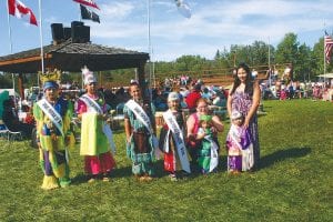 The Grand Portage Traditional Powwow includes many meaningful moments, such as the naming of the Grand Portage Royalty. Thirteen youths bravely danced in the following categories: Tiny Tot Brave Alex and Antonio Santos; Tiny Tot Princess Holly Dahl and Ashlyn Childs; Junior Brave Isaiah Deschampe and Hunter Childs; Junior Princess Kassia Deschampe, Selene Lien, Christina James; Senior Brave Jaden Aubid and Cody Tesser; and Junior Princess Samantha Scalise and ShaeLynn Novitsky. They all were wonderful and the judges had a tough time selecting the 2012 Royalty, pictured above (L-R) Senior Brave Cody Tesser, Senior Princess Samantha Scalise, Junior Brave Isaiah Deschampe, Junior Princess Kassia Deschampe, Tiny Tot Brave Antonio Santos, with his mom, Lena and Tiny Tot Princess Holly Dahl with her mom, Kristin Kleett.