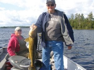 Terry Englund of Grand Marais with the 28½ inch walleye taken on his annual birthday fishing trip with Mike Berg. The Englunds had great walleye fishing on Saganaga and Northern Light Lake.