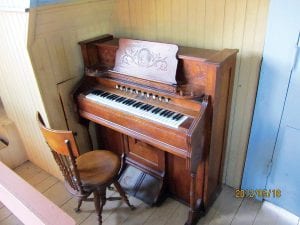 Left: The beautiful old organ back in its historical place in the lovely old church.