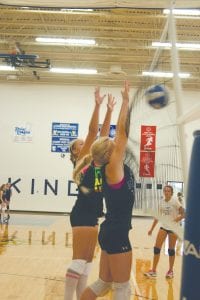 Far left: Ali Iverson (left) and Jessica Berg–Collman go up for a block in a recent volleyball practice. With 34 kids out, the team should once again do well in conference play. Above: Last year’s boys' cross country team returns most letter winners and should finish in the top third of the Section 7A competition. Pictured in the pack above are Ben Seaton, Joey Chmelik and Nate Carlson. The girls' team is even more loaded and should contend for a state berth. Left: Head Coach Mitch Dorr has been conducting rigorous football practices. With a lot of returning starters, the team should once again contend for a conference championship. The first game is Friday, August 31 at home against Two Harbors. The game starts at 7 p.m.