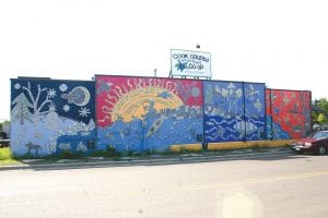 The oft-photographed mural on the north wall of the Cook County Whole Foods Coop means a lot to many people—the dozens of elementary schoolchildren involved in creating the four-season mosaic, the teachers and community volunteers involved in designing and installing the tiled mosaic and the many community members who believe that public art is important. An effort is under way to raise the funds needed to save the mural during reconstruction of the co-op building.