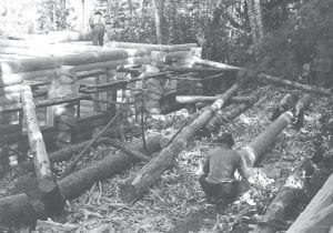 This photo, taken in August 1940, shows the construction of a cabin on Clearwater Lake by Charlie Boostrom. The Boostrom family knows that Charlie Boostrom built his first cabin in 1913 on Moon Lake. And they know that Charlie built Clearwater Lodge in 1925, as well as many other log cabins and rock fireplaces in the Gunflint Trail/Grand Marais area. The family is trying to compile a list of those cabins and fireplaces. Do you know of a structure or fireplace that Charlie built? If so, contact Oz and Linda Twedt at (218) 388- 2247. Any leads to help compile this bit of Cook County history would be appreciated.